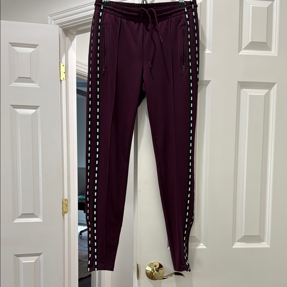 Victoria’s Secret Pink aubergine joggers, size XS.